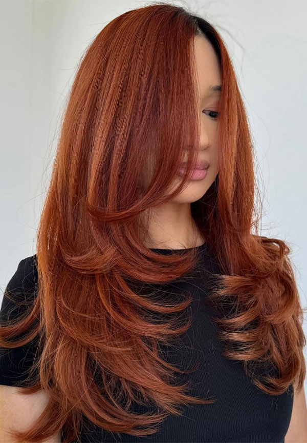 Fiery Auburn Layers,  long layered haircut with curtain bangs, voluminous long layered haircut, long layered hairstyle