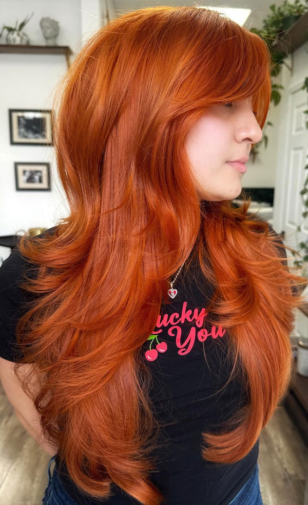 40 Long Layered Hairstyles to Enhance Straight Hair : Fiery Copper Layers with Bold Volume