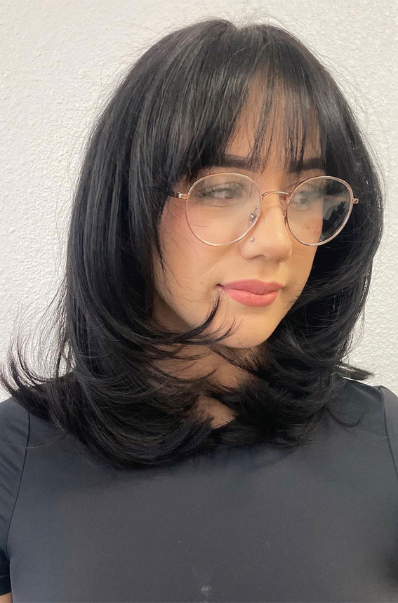 Flipped Layers with Wispy Bangs, shoulder length layered haircut, Trending Medium Layered Haircuts, medium length layered haircut, medium length layered hairstyle