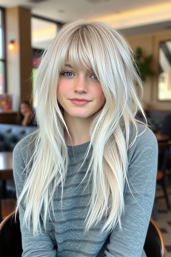 35 Trendy Long Straight Haircuts To Try Now : Frosted Blonde Tousled Layers with Airy Bangs