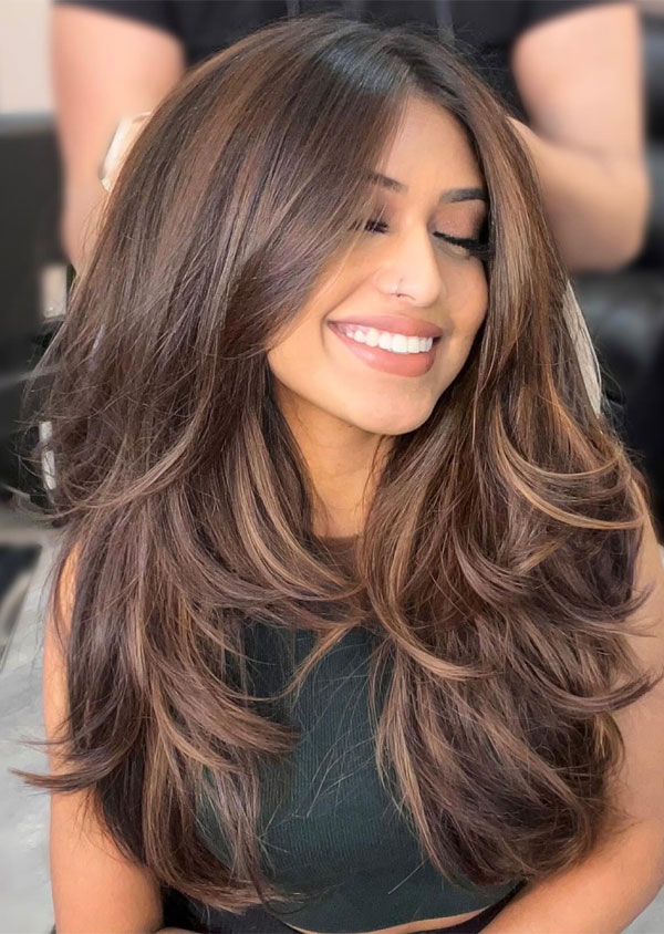 Lush Brunette Layers, long layered haircut with curtain bangs, voluminous long layered haircut, long layered hairstyle