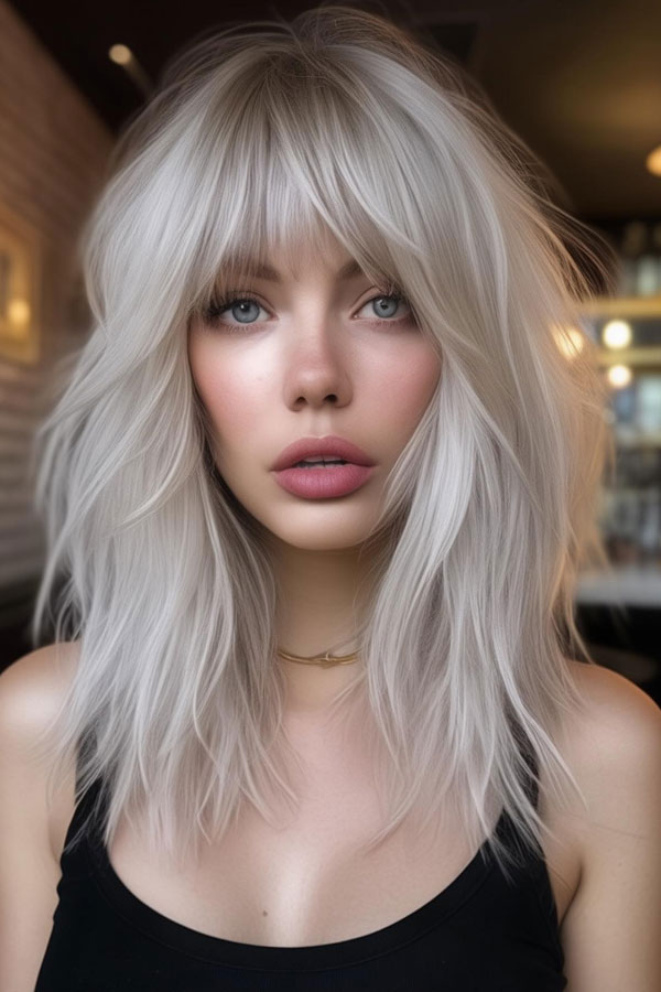 39 Flattering Medium Hairstyles Perfect for Thin Hair : Platinum Shag with Wispy Bangs