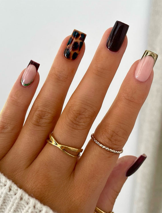 Tortoiseshell French with Dark Elegance, Trendsetting Autumn Nail Designs, almond nails, fall nail design