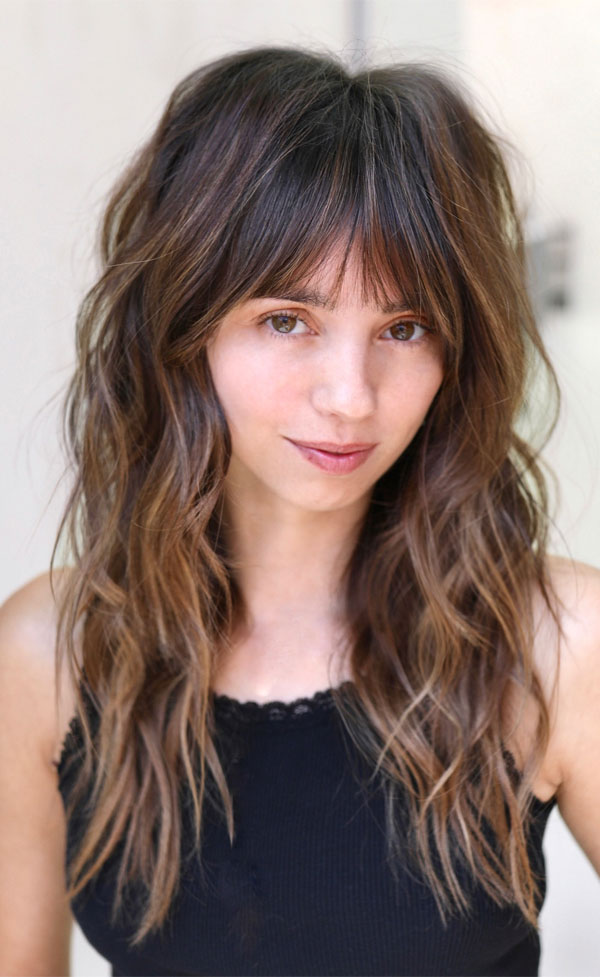 50 Beautiful Long Shag Haircuts for Effortless Style : Tousled Brunette Shag with Wispy Bangs