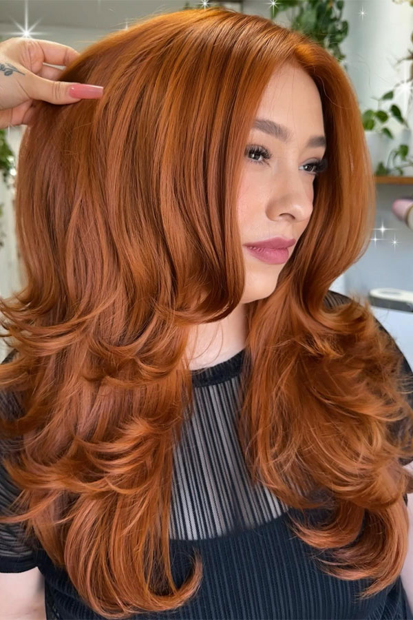 40 Long Layered Hairstyles to Enhance Straight Hair : Vibrant Copper Layers with Soft Waves