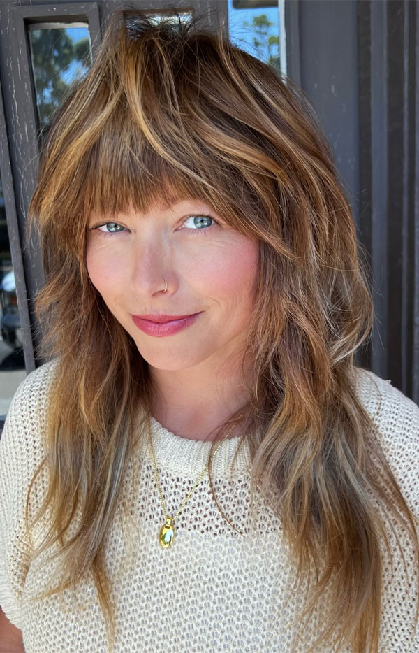 50 Beautiful Long Shag Haircuts for Effortless Style : Warm Honey Shag with Wispy Bangs