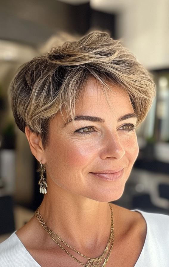 Soft Layered Pixie with Blonde Highlights,  Easy Wash-and-Wear Haircuts for Women 50+, low maintenance haircut for women over 50, wash and wear haircut for women over 50