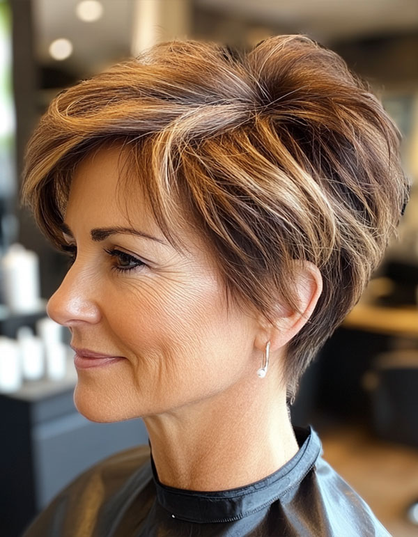 35 Easy Wash-and-Wear Haircuts for Women 50+ : Voluminous Pixie with Caramel Highlights