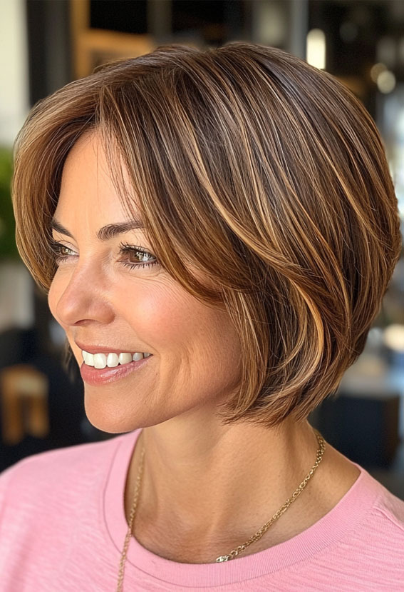 30 Fresh and Youthful Hairstyles Over 50 : Chin-Length Bob with Soft Layers