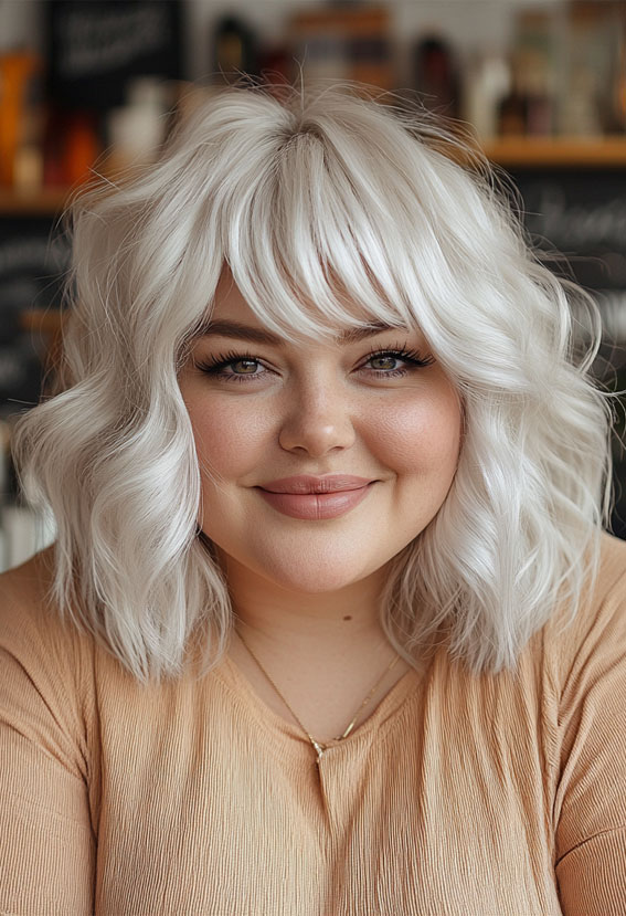 Platinum Blonde Soft Wavy Bob with Wispy Bangs, medium haircuts for round faces, Medium long hairstyles for fat faces female,Medium long hairstyles for fat faces straight hair, Slimming haircuts for chubby faces, Short to medium hairstyles for round faces, Medium length layered haircut for round face, Medium length hairstyles for round faces straight hair