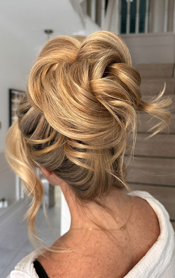 Tousled Blonde Updo with Soft Waves, Voluminous Piled Updo, Pamela Anderson Inspired Updo Hairstyle, messy updo, piled updo hairstyle, retro updo hairstyle