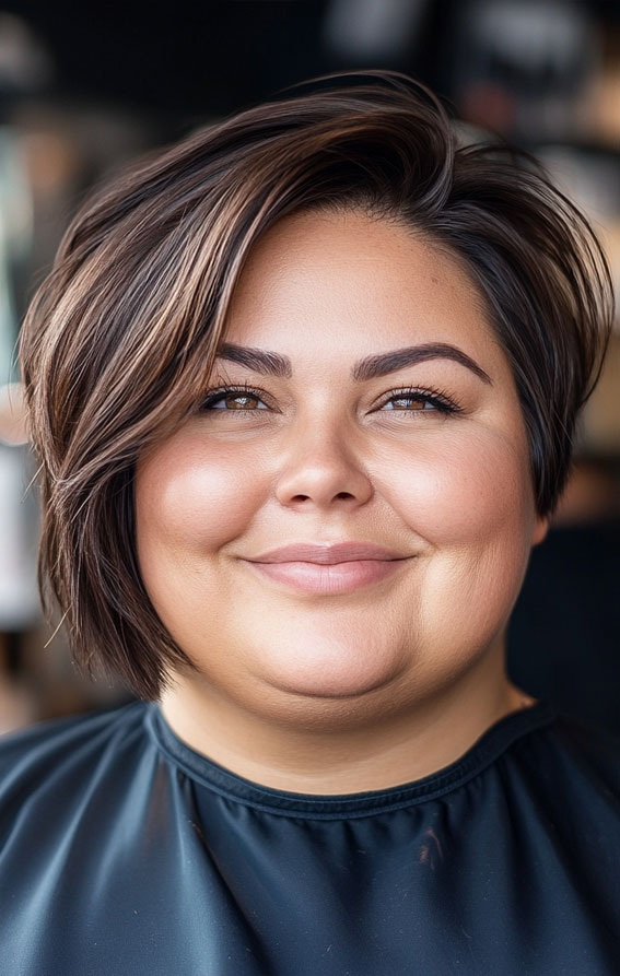 42 Short Hairstyles for Fat Faces and Double Chins : Asymmetrical Bob with Subtle Highlights