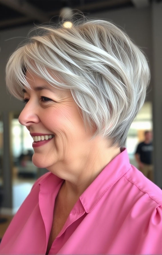 21 Slimming Short Haircuts for Chubby Women Over 60 : Icy Blonde Feathered Bob