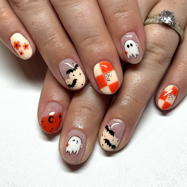 40 Halloween Nail Designs to Try This Season : Playful Halloween Patchwork