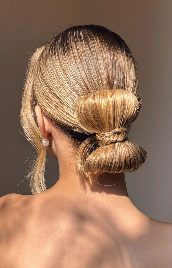 30 Hot and Trendy Updo Hairstyles : Sleek Braided Bow Low Bun