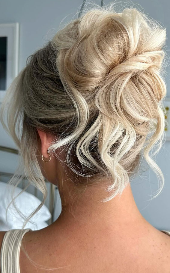 Chic Twisted Piled Updo, Effortless tousled bun, Voluminous Blonde Messy High Updo , Messy Piled Updo Hairstyle, Pamela Anderson Inspired Updo Hairstyle, messy updo, piled updo hairstyle, retro updo hairstyle