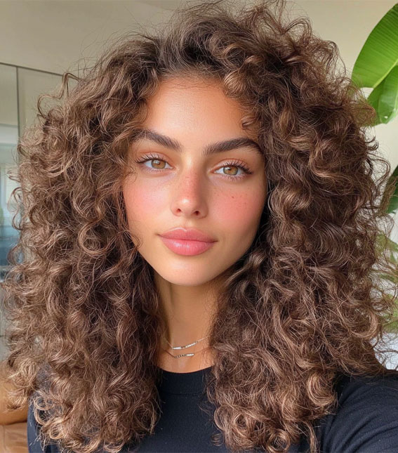 Soft Mushroom Brown Curls with Layered Bounce, Shoulder length curly hair with layers, low maintenance Shoulder length curly hair with layers, medium length curly hair with layers, Shoulder length curly hair with layers and bangs, natural curly haircut, natural curly hair with layers