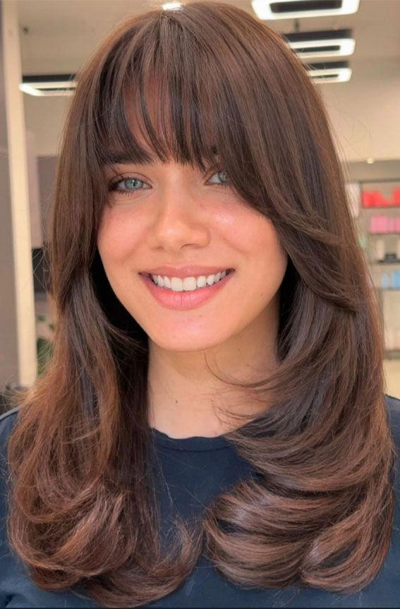 45 Winter Hair Colour Inspiration You Can’t Miss : Soft Brown Layers with Curtain Bangs