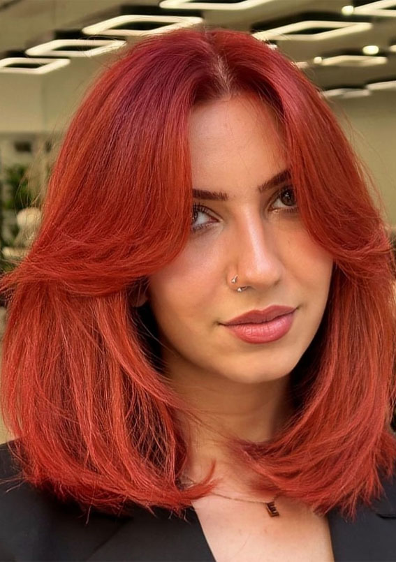 30 Hottest Hair Colours to Try This Winter : Fiery Copper Long Bob with Curtain Bangs