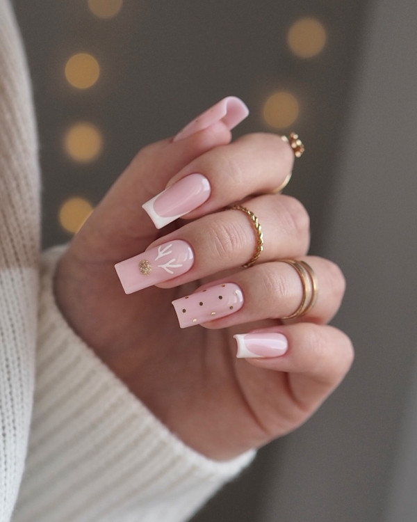 37 Elegant and Cute Christmas Nail Designs : Subtle Reindeer Charm