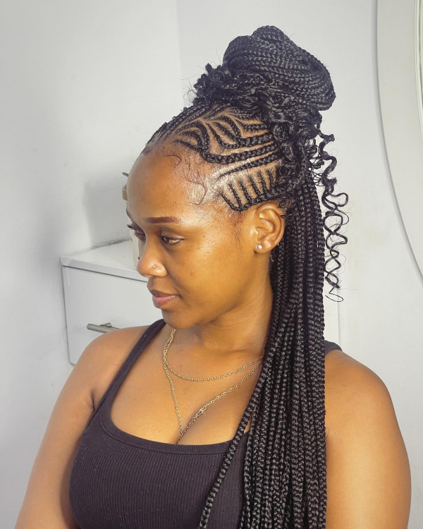 20 Modern Fulani Braids With Curls To Rock Right Now : Edgy Tribal Fulani Braids in a Sleek Bun