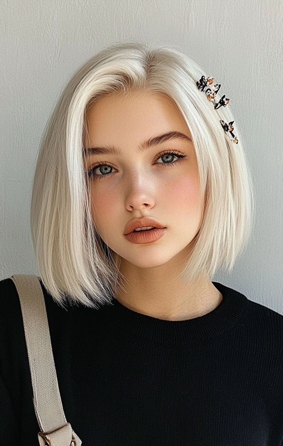 32 Effortless Hairstyles That Look Chic in Minutes : Sleek Platinum Bob with Butterfly Clips