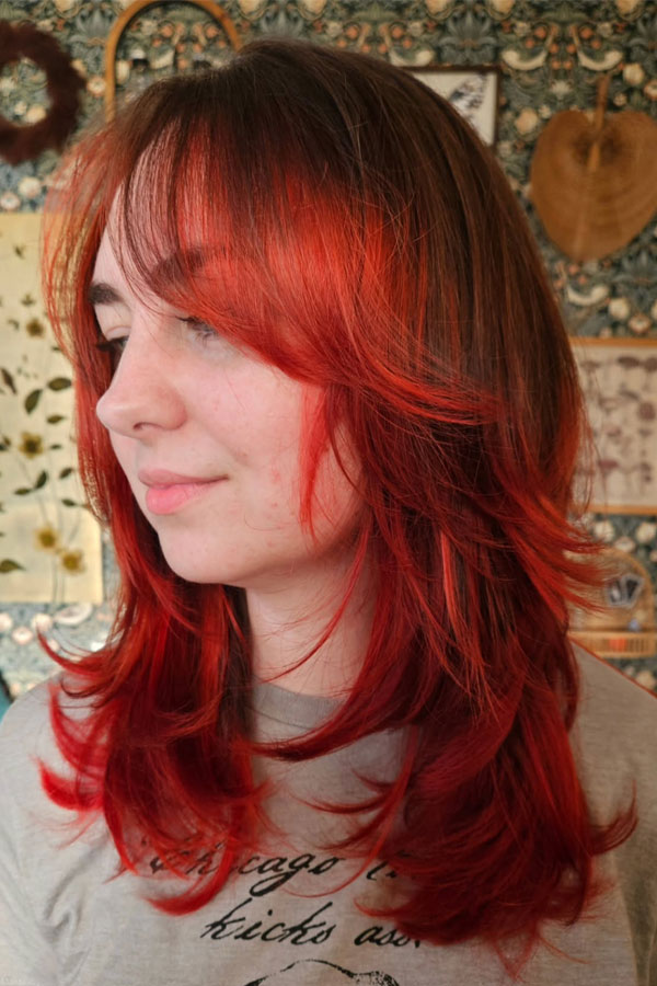 41 Red Hair Colours You’ll Adore: Flame-Tipped Feathered Layers