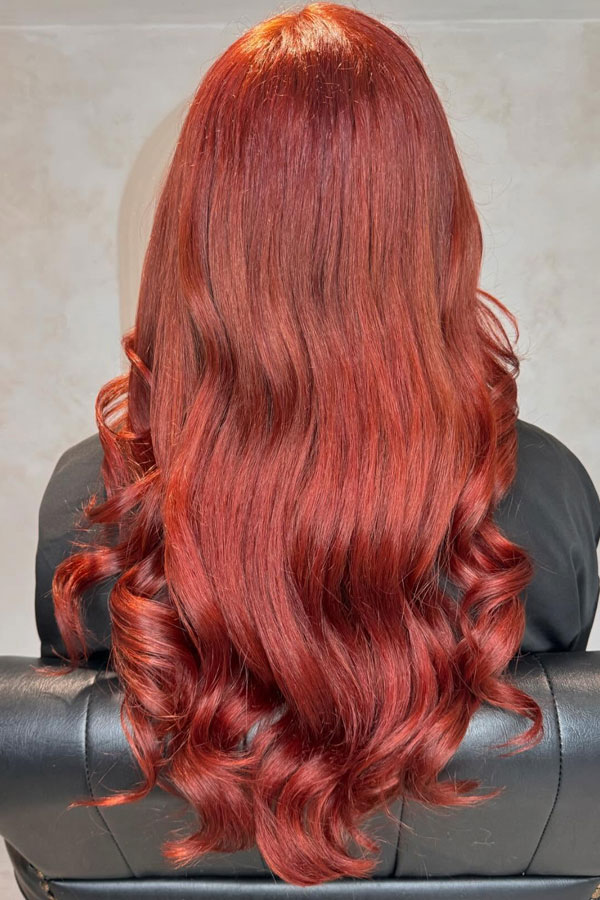 41 Red Hair Colours You’ll Adore: Glossy Red Auburn Long Bouncy Blowout Hairstyle