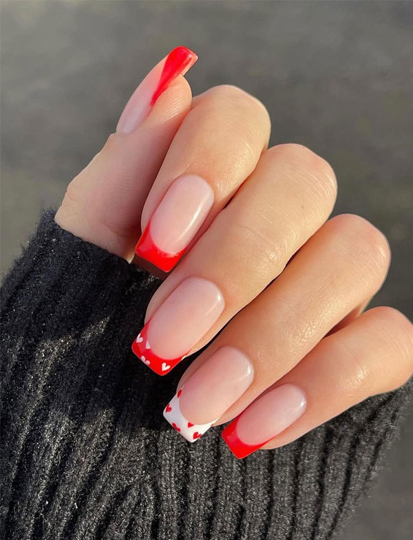 36 Cute Valentine’s Day Nails : White & Fiery Red French Tips with Heart Accents