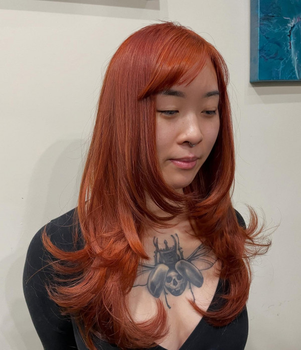 50 Stunning Warm Hair Colour Ideas : Fiery Tangerine Layers with Wispy Bangs