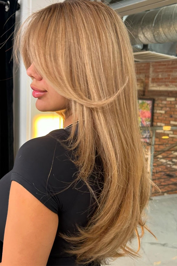 Golden Sandy Blonde Long Hair with Feathered Layers