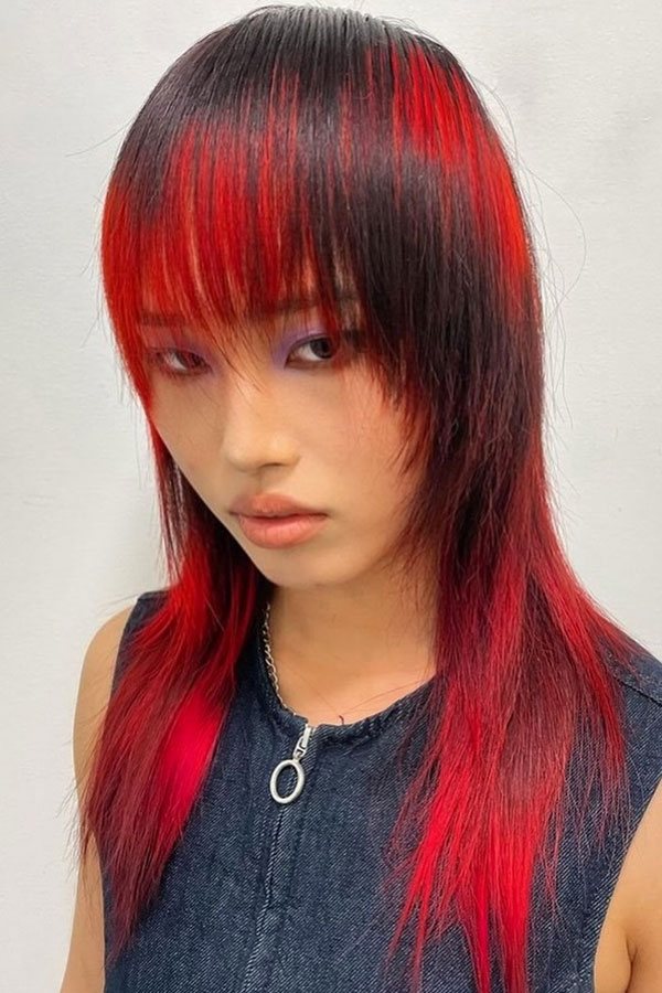 41 Red Hair Colours You’ll Adore: Vibrant Scarlet Shag with Black Undertones