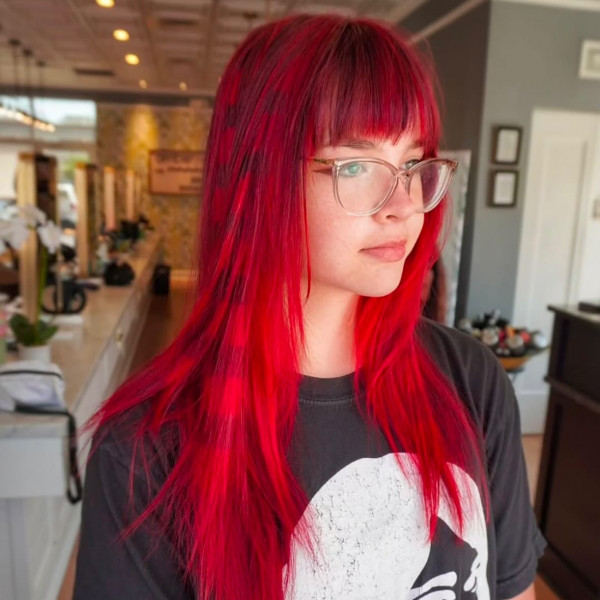 41 Red Hair Colours You’ll Adore: Neon Scarlet Straight Layers