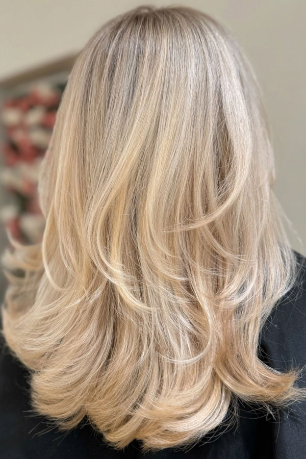 Classic Vanilla Blonde with Feathered Layers