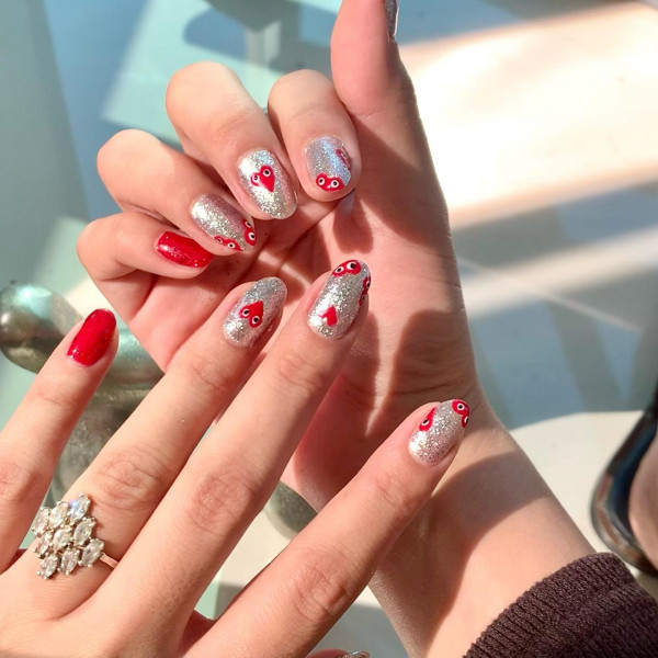 Sparkling Silver Nails with Red Comme des Garçons Accents