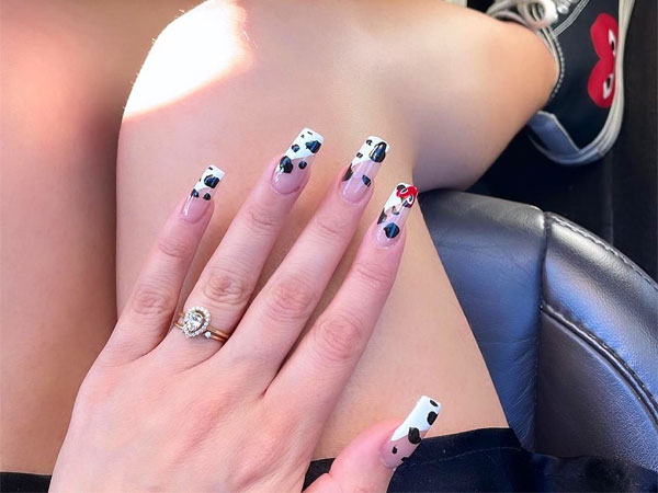 Cow Print Tips with Comme des Garçons-Inspired Nails , Comme des Garçons-Inspired animal print Nails , Comme des Garçons Tip Nude Nails, acrylic Comme des Garcons nails