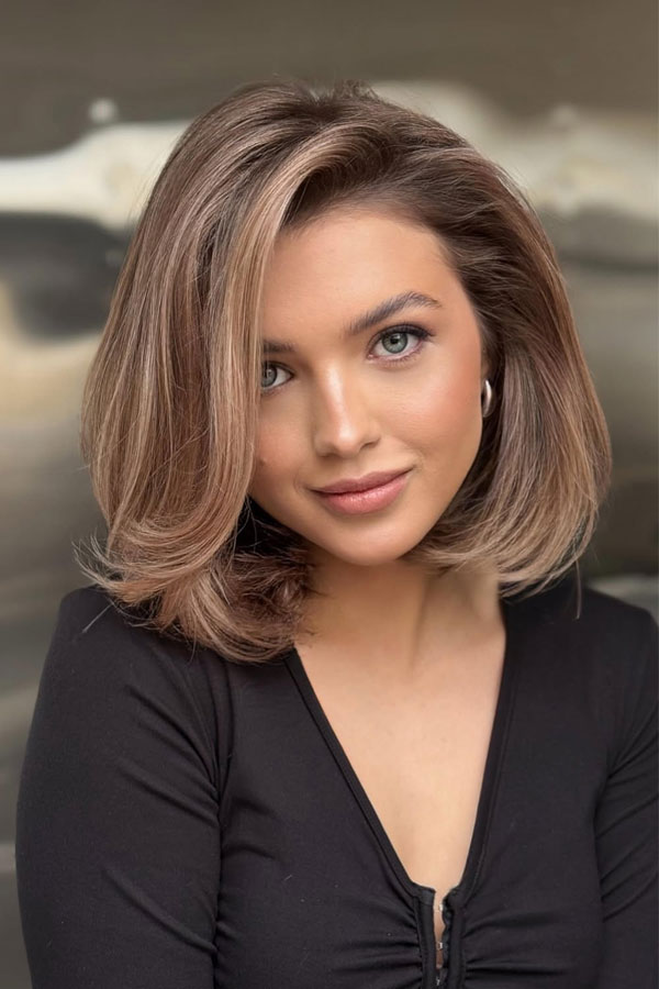 30 Medium-Length Haircuts for Different Face Shapes : Voluminous Blowout Bob