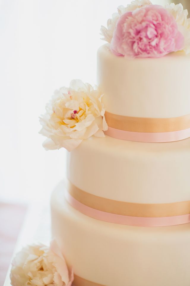 simple pink and gold wedding cake
