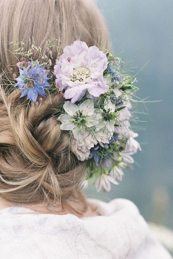 wedding updo hairstyles with blue flowers