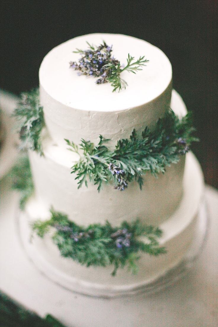 white wedding cake,white wedding cake with green leaves