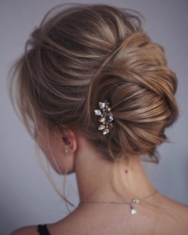 This french twist updo hairstyle perfect for any wedding venue