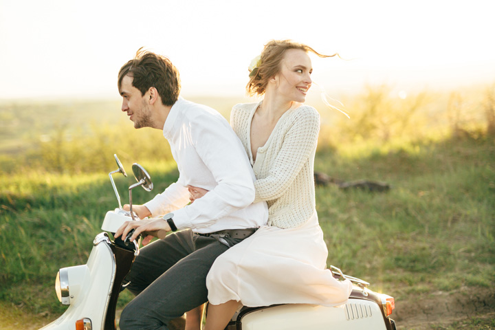 Adorable bride and groom having ride on vespa | engagement session | fabmood.com #wedding #weddingportrait