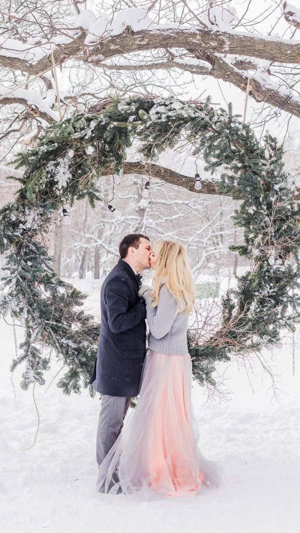 Dreamy winter wedding photos with snow background