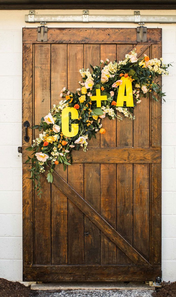 citrus wedding decor, colorful garland