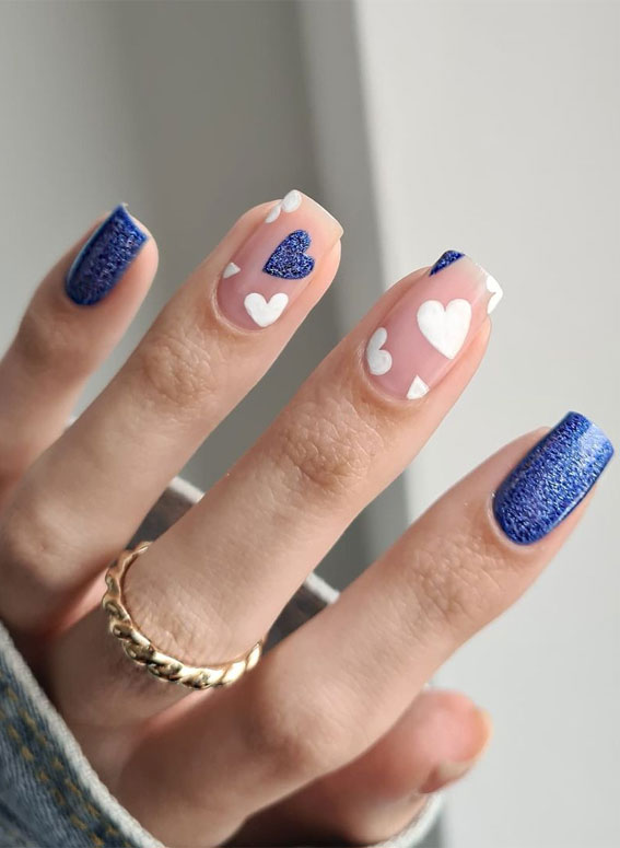 mix and match blue and white nails, white heart nails, shimmery blue and white heart nails