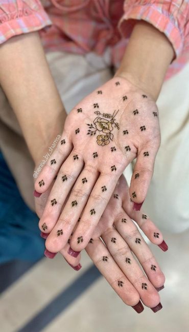 32 Captivating Henna Designs : Simple Print with Floral Centerpieces 1 ...