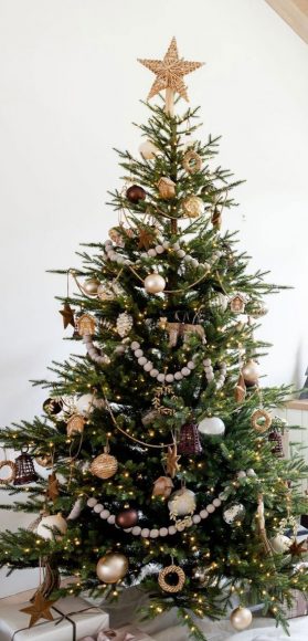 Radiant Evergreen: A Symphony of Joyful Ornaments and Glittering Lights ...