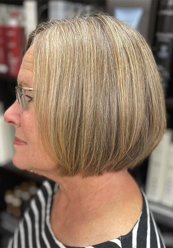 sleek bob middle part, sleek bob for women over 50, short hairstyles for women over 50 