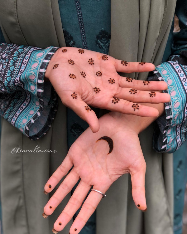 40 Modern Front Hand Mehndi Designs : Playful Crescent and Floral Mehndi