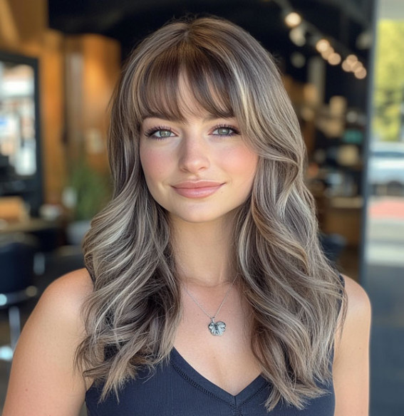 Layered Waves with Wispy Bangs, Which haircut suits for round face female short hair, Which haircut suits for round face female hairstyles, slimming haircuts for chubby faces, Hairstyle for round chubby face, Layered haircut for round face, Haircut for round face female long hair, Best haircuts for round faces